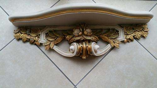 An Ornate Composite Shelf with Wooden Top