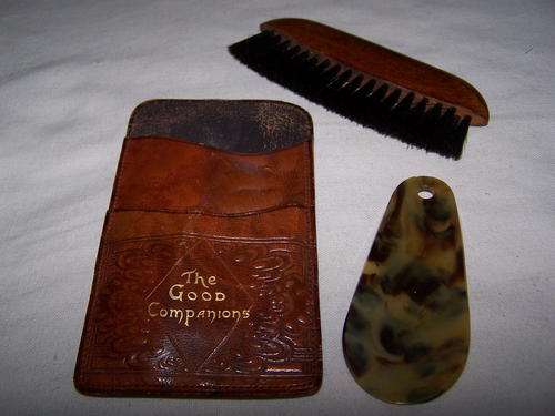 Vintage Travelling Set comprising: Embossed Leather Pouch, Celluloid Shoe Horn, Wooden Clothes Brush