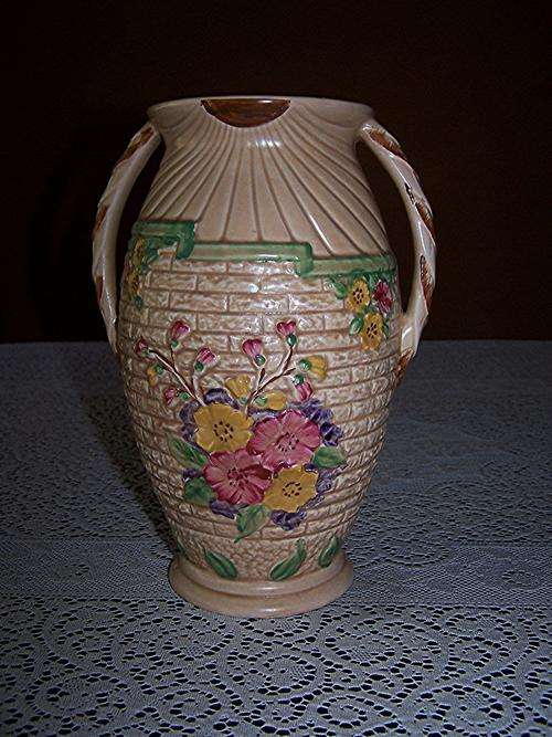 Arthur Wood Embossed Hollyhock Hand Decorated Vase.