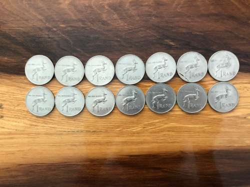 Complete collection of South African R1 coins from 1977 to 1990