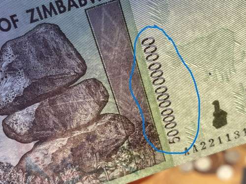 Zimbabwe 50 trillion dollar banknote - probably UNC - I cannot find any folds, creases or pin-holes.