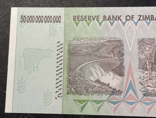 Zimbabwe 50 trillion dollar banknote - probably UNC - I cannot find any folds, creases or pin-holes.