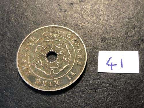 1941 Holed Rhodesian 1 penny coin - King George VI