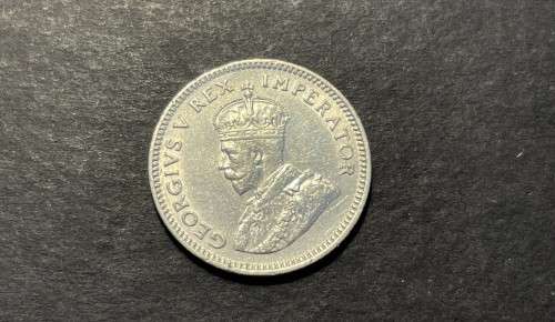 SCARCE 1927 SA Silver 6 pence coin in +/- AU Catalogue value is R4,000