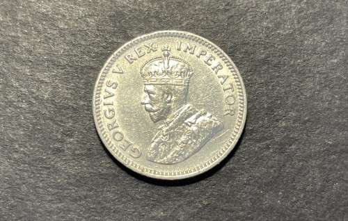 SCARCE 1927 SA Silver 6 pence coin in +/- AU Catalogue value is R4,000