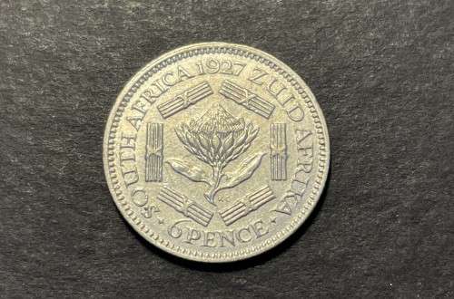 SCARCE 1927 SA Silver 6 pence coin in +/- AU Catalogue value is R4,000