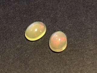 BEAUTIFUL ETHIOPIAN OPAL PAIR 0.95CT - GREAT DEAL!!