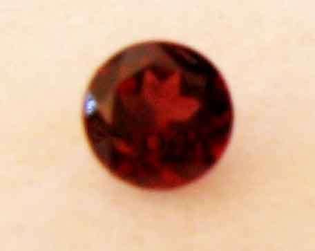 Garnet 7.10mm round cut 1.52ct.