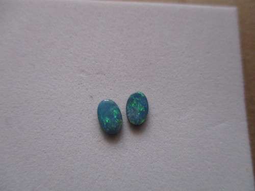 1 lot , 2 Pieces of 6.00 x 4.00 mm Doublet Opals , T. W. 0.67 ct.