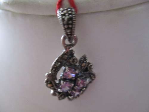 925 Sterling Silver, Marcasite and Amethyst Pendant .
