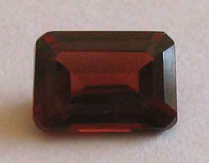 7.00 x 5.00 mm Emerald cut Genuine Garnet .92 ct
