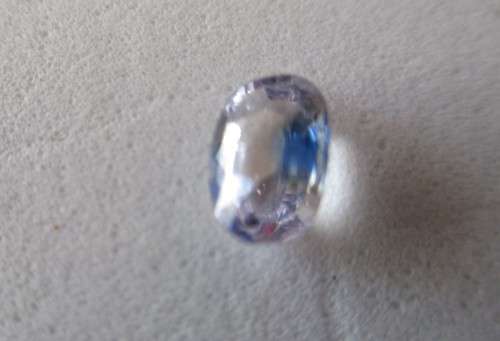 6.10 x 4.10mm Oval cut Genuine Pink -Bluish Sapphire 0.60ct.