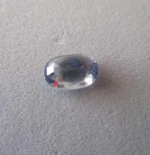 6.10 x 4.10mm Oval cut Genuine Pink -Bluish Sapphire 0.60ct.