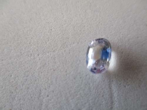 6.10 x 4.10mm Oval cut Genuine Pink -Bluish Sapphire 0.60ct.