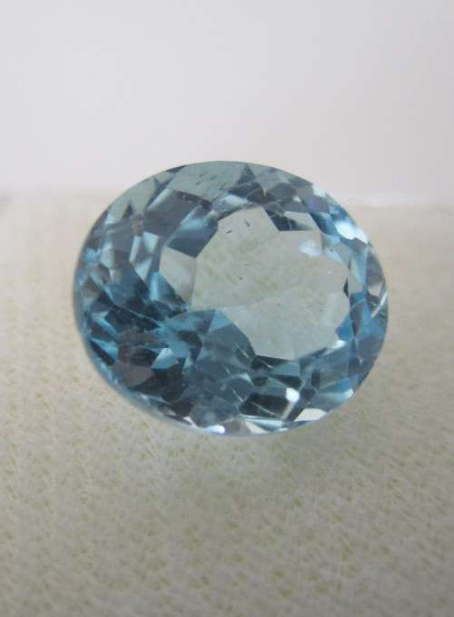 6.74ct . Blue Topaz Oval Cushion cut  12.00 x 10.00mm