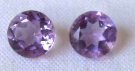 2 pieces of  4.75 mm Round cut amethysts, T. W.  0.77 cts.