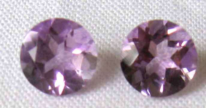 1lot, 2 pieces of  5.10 mm Round cut Amethysts, T. W.  0.89 cts.