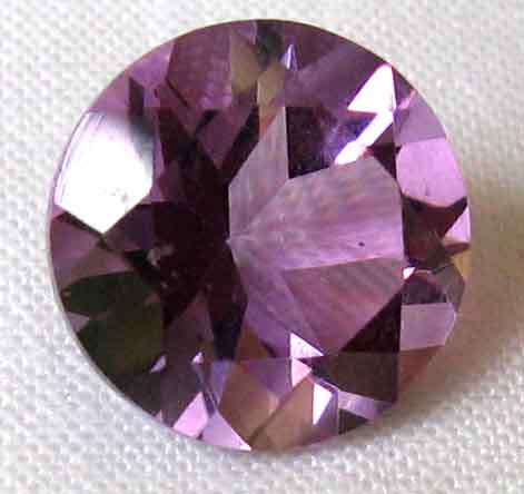 Genuine  9.00 mm Round faceted cut  Amethyst  2.49 cts.