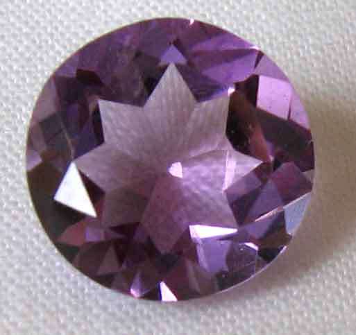 Genuine  9.10 mm Round faceted cut  Amethyst  2.38 cts.
