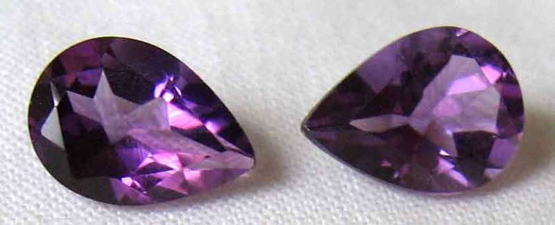 1 lot, 2 pieces of  8.00 x 6.00 mm Pear - faceted cut Amethysts, T. W. 1.94 cts.