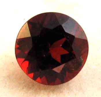 Genuine  9.00 mm Round faceted cut  Garnet  3.07 cts.