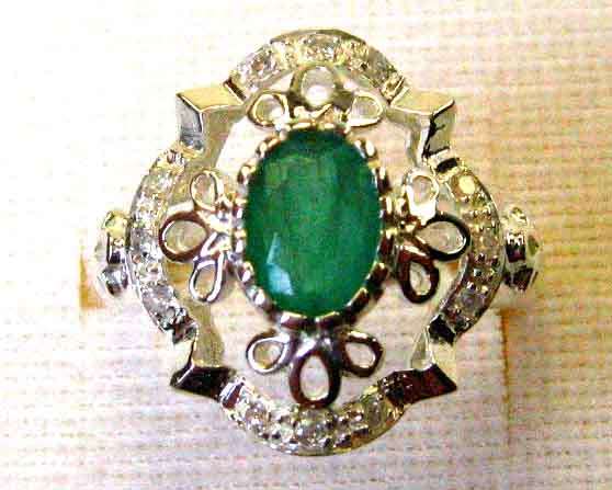 Genuine Sterling Silver, Emerald  and Diamonds Ring.