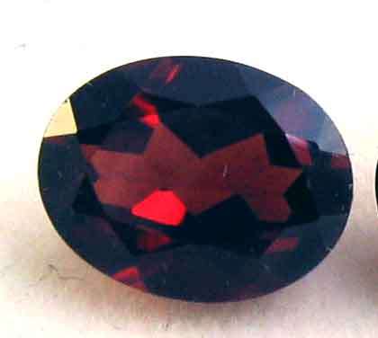 11.00 x 9.00 mm Oval faceted cut Garnet 4.41 cts.
