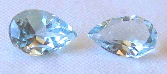 1 lot, 2 pieces of  6.00 x 4.00 mm  pear cut blue topaz  T. W.   0.98 ct.s
