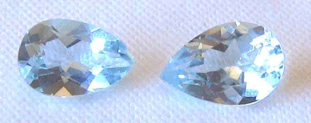 2 pieces of  6.00 x 4.00 mm  pear cut blue topaz  T. W.  1.02 ct.s