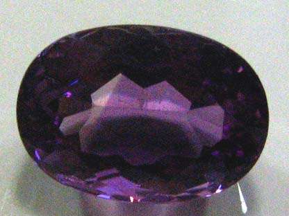 Top Quality,  14.00 x 10.00 mm Oval - faceted cut  Amethyst  5.60 ct.s