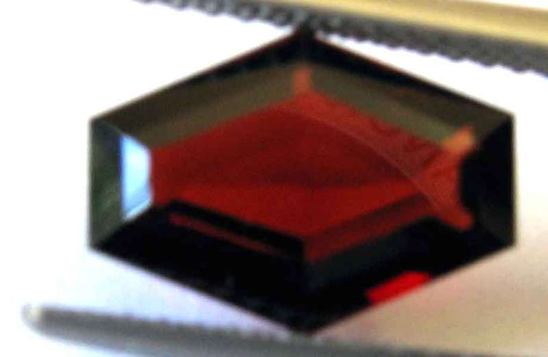 10.50 x 7.50 mm Fancy cut Garnet 1.02 cts.