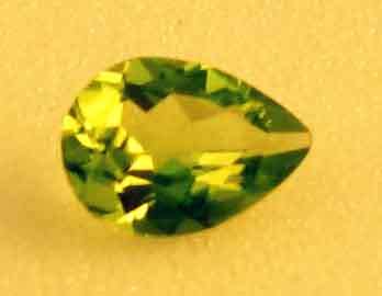 6.00 x 4.00 mm pear cut Peridot 0.46 ct.
