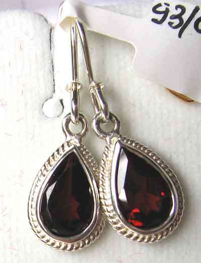 A pair of  Beautiful Sterling Silver and Garnets Earrings.