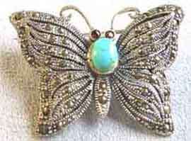 Sterling Silver, Marcasite, Turquoise and Garnet ` Butterfly ` Brooch.