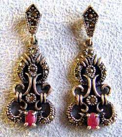 Unusual, A Pair of Sterling Silver, Marcasite and Genuine Rubies Earrings