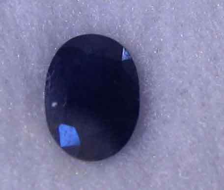Genuine ,  7.00 x 5.00 mm Oval cut Blue Sapphire 1.04 ct.