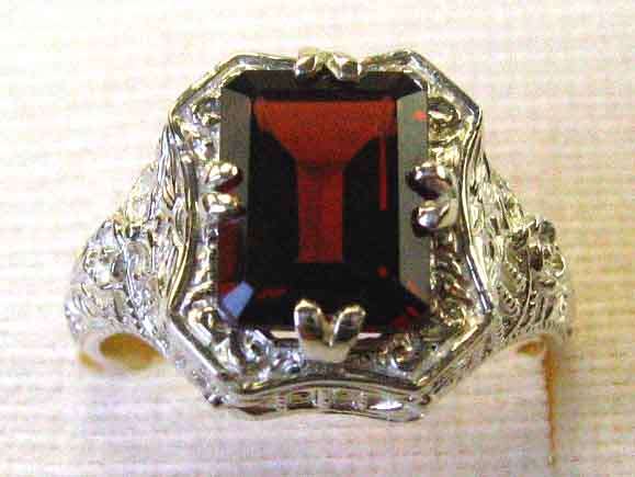 Decorative Sterling Silver and Genuine Garnet Ring.
