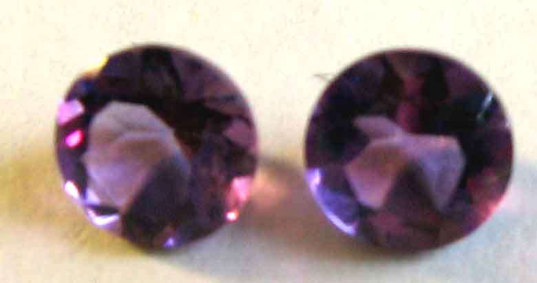 2 pieces of 6.00 mm round faceted cut Amethysts, Total weight 1.45 ct.