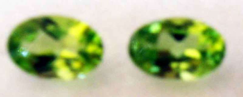 2 Pieces of 5.00 x 3.00 mm Oval cut Peridots, T. W. 0.43 ct.