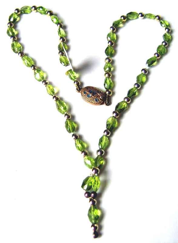 Genuine Sterling Silver and Peridots Necklace.