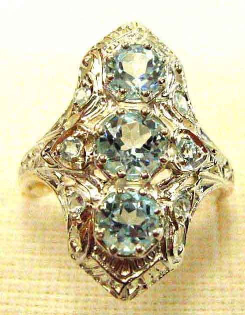 Decorative -Sterling Silver and Genuine Sky Blue Topaz Ring.