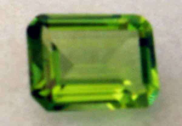 9.00 x 7.00 mm Emerald cut Peridot 2.95 ct.
