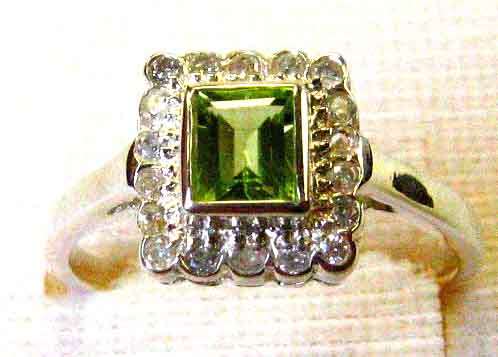 Lovely Sterling Silver and Genuine Peridot and Diamonds Ring.
