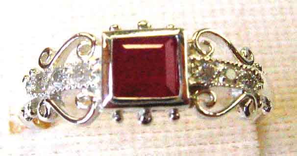 Lovely- Sterling Siver and Genuine Ruby & Diamonds Ring.