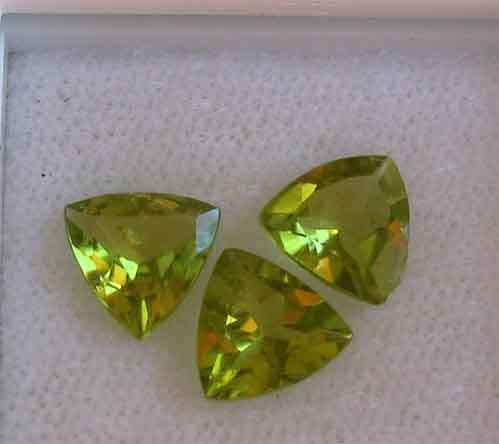 3 pieces of 6.00 mm trillion faceted cut peridot , T. W. 2.03 ct.