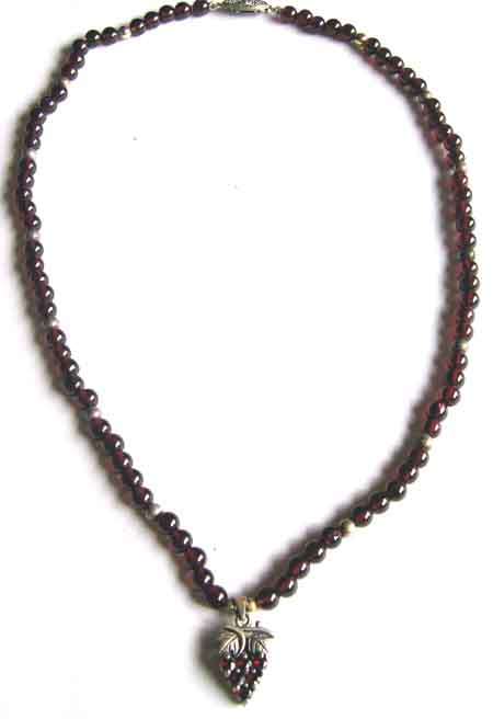 Geuine Garnets and Sterling Silver garnet pendant on Necklace .