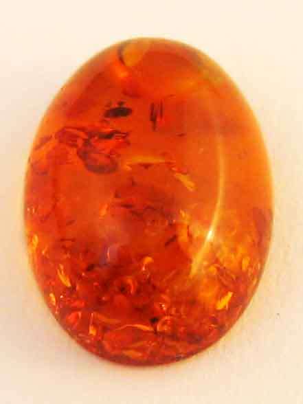 1 lot , 2 pieces of 8.00 x 6.00 mm Oval Cab. Amber , T. W. 0.91 ct.
