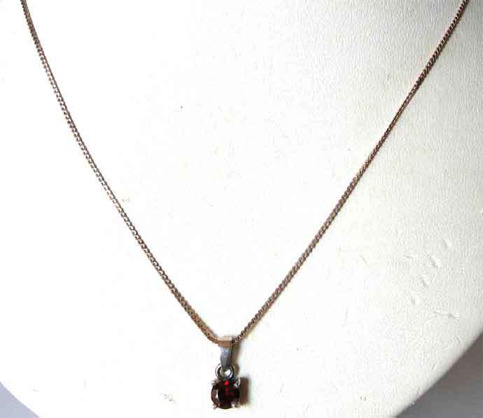 Sterling Silver Chain and Genuine Garnet  Pendant.