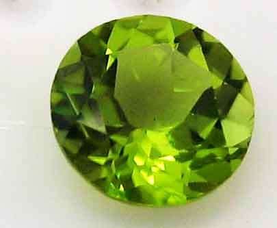6.00 mm round cut Peridot 0.88 ct.
