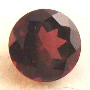 7.00 mm Round faceted cut Garnet 1.63 ct.